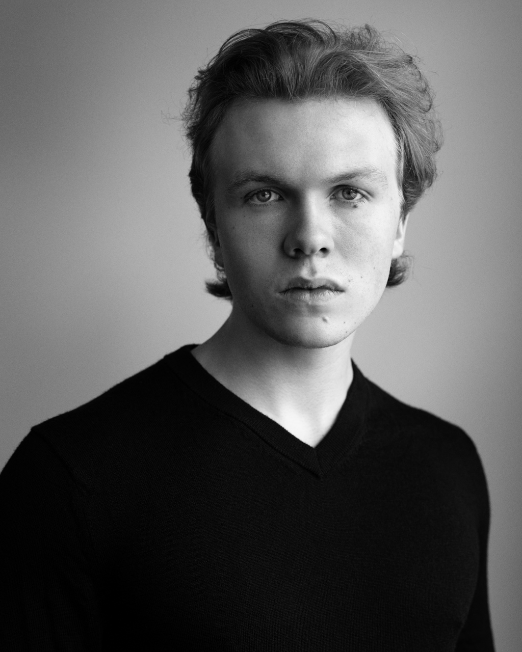 A Vancouver actor's headshot in black and white.